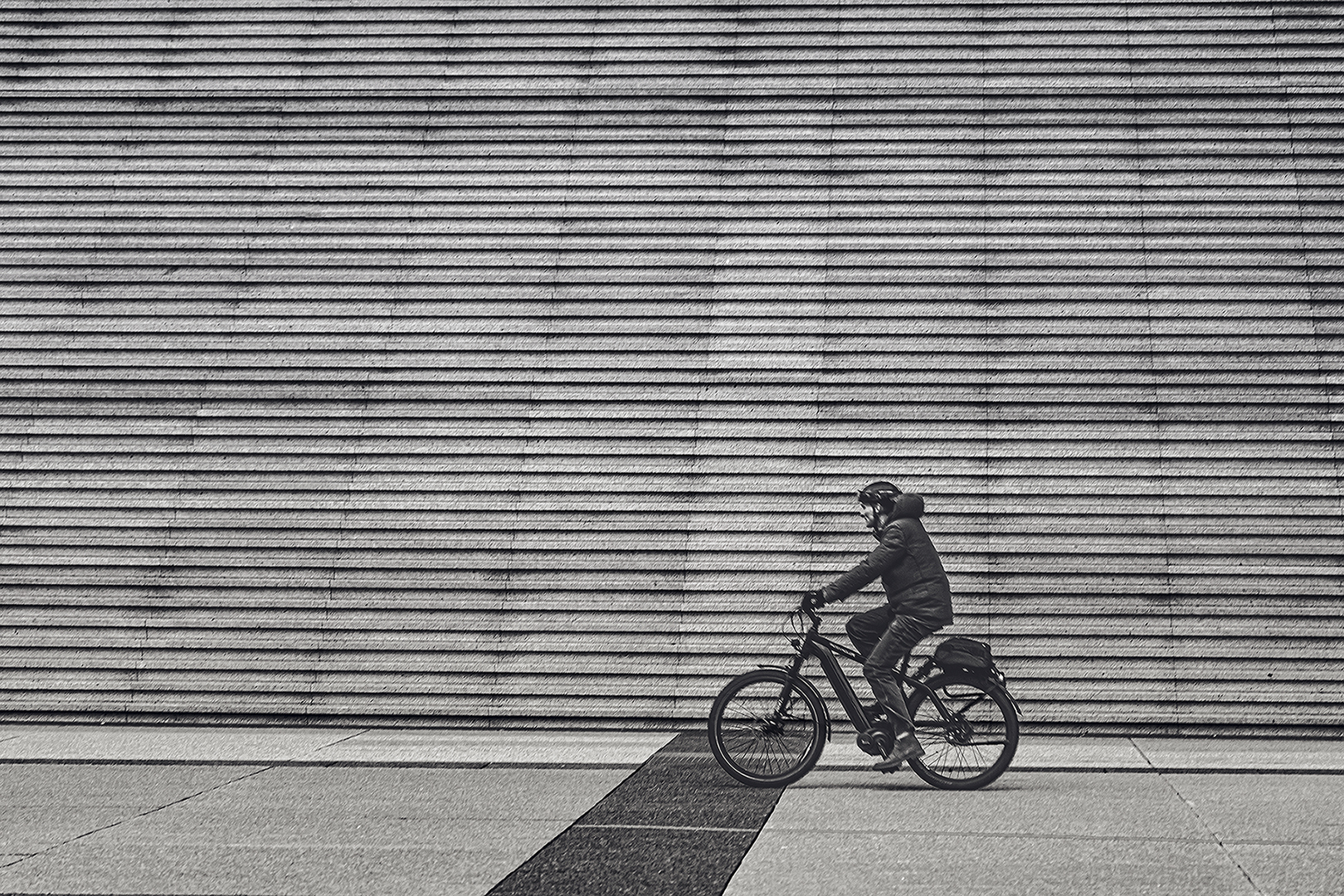 Ciclista en Grande Arche
