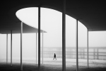 Walking in the fog along the pier 03